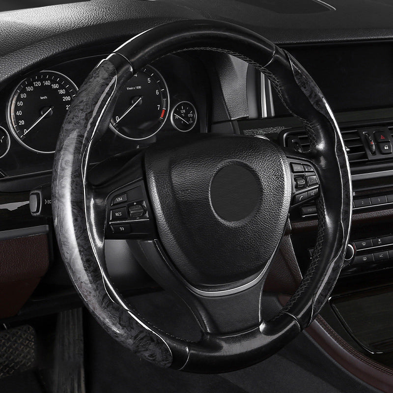 🔥Megragadod és megszereted!🔥Univerzális csúszásmentes autós kormánykerék borítás